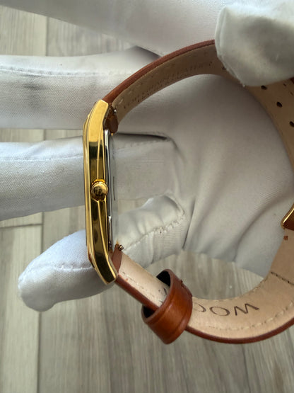 Bulova rectangular dress watch, gold-tone case on a leather strap, quartz movement
